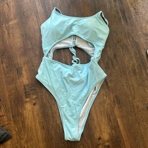 Baby blue swimsuit. XL but fits like a large.